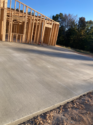 Smooth concrete garage slab at a new home framing in Franklin TN